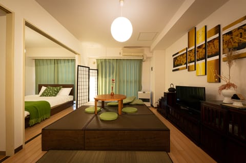 Deluxe Room | Living area | LCD TV