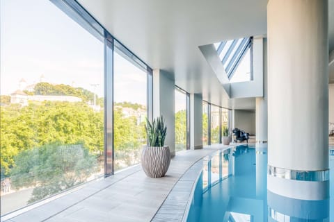 Indoor pool, open 6:00 AM to 10:00 PM, sun loungers