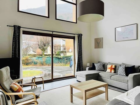 The open plan comfortable lounge offers a great setting to relax in after a day in the mountains