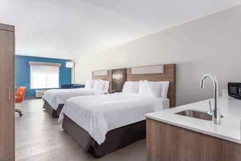 Suite, Multiple Beds | In-room safe, desk, soundproofing, iron/ironing board