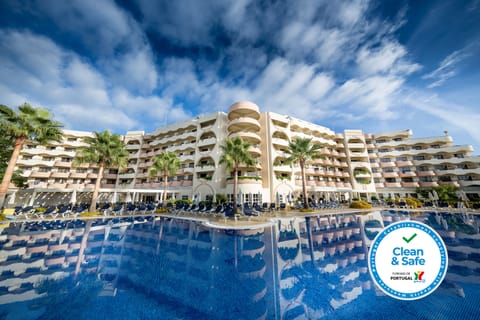 Indoor pool, outdoor pool, pool umbrellas