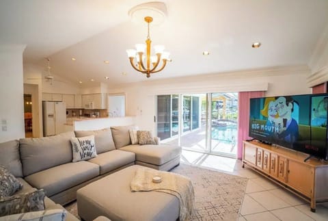 Living room gel comfortable sofa with pool and canal views.