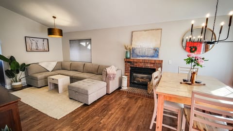 Open concept living and dining area comfortably seats 6