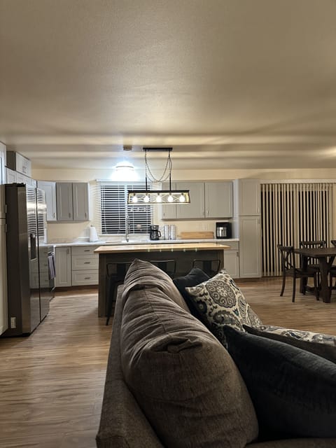 Large open kitchen with butcher block island 