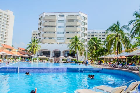 2 outdoor pools, open 8:00 AM to 7:00 PM, pool umbrellas