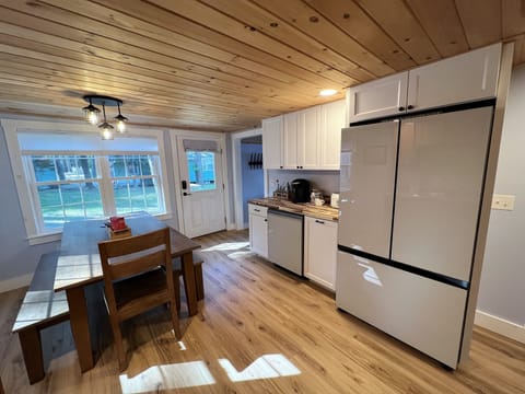 The kitchen with huge farm table to ensure victory over your family on gamenight