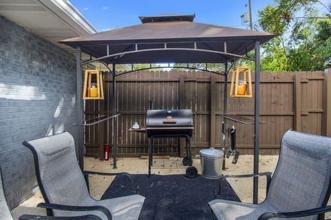 Covered area with charcoal grill