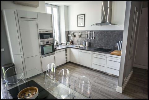 Fully equipped, open plan kitchen - complete with dishwasher, oven, microwave and washing machine