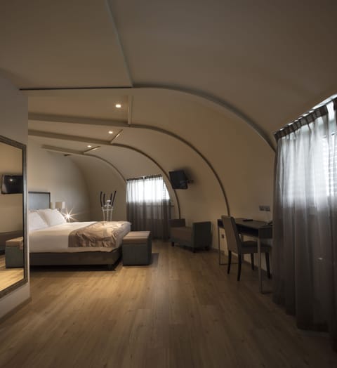 Family Room | Down comforters, minibar, in-room safe, desk
