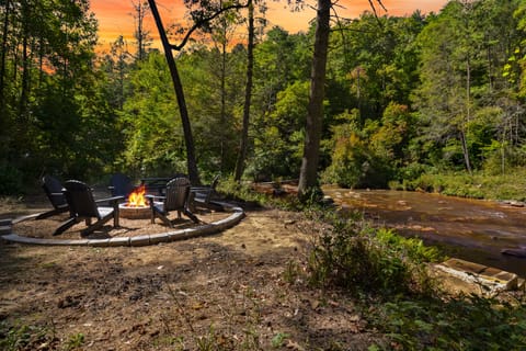 Enjoy the private fire pit and picnic table along the creek.