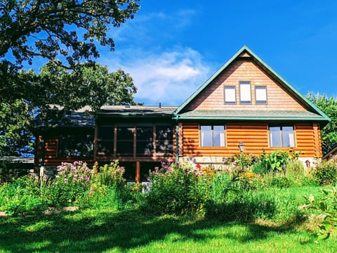 Perennial garden attracts birds and butterflies. Veggie garden for picking!