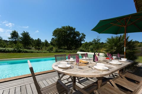 Enjoy your meal by the pool.