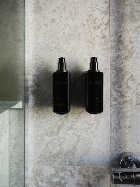 Bathtub, free toiletries, hair dryer, bathrobes