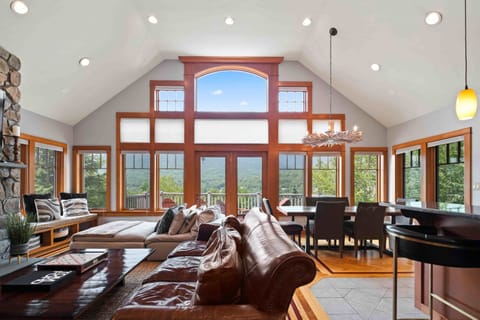 Soak in stunning mountain views from the spacious, light-filled living area—perfect for relaxing or entertaining. 