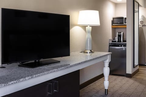 Desk, blackout drapes, iron/ironing board, cribs/infant beds