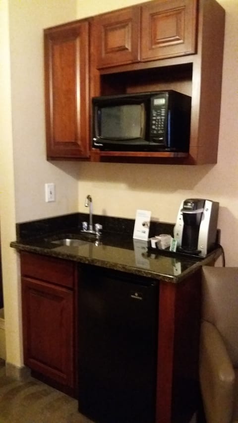 Suite, 1 King Bed with Sofa bed (Addl Living Area) | Desk, blackout drapes, iron/ironing board, free cribs/infant beds