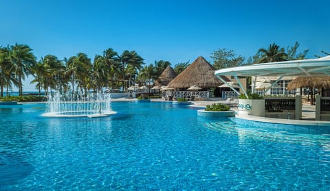 Outdoor pool, open 8 AM to 8 PM, pool umbrellas, sun loungers