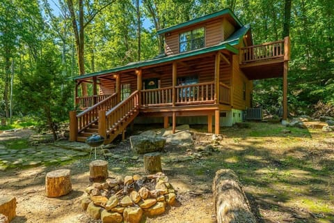 Front of house with view of fire pit