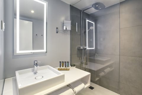 Eco-friendly toiletries, hair dryer, towels