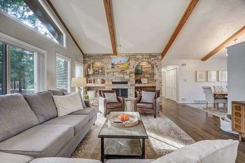 The living area has enough space for everyone to congregate and has a cabin-like atmosphere.