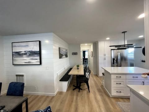 Built in bench and kitchen table with seating for eight.