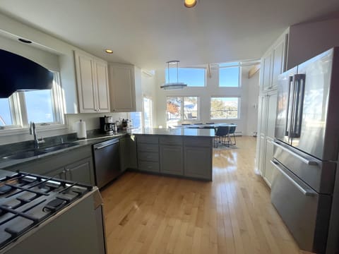 Kitchen with all the need items for any cook with a nice view of the mountains