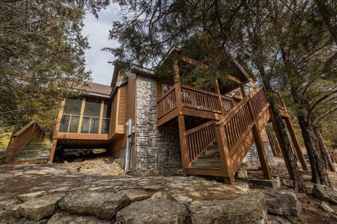 Full 2-bedroom home in wooded resort area. Double master suites. No stairs needed to enter side entrance off driveway. 
