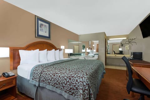 Deluxe Studio Suite, 1 King Bed, Non Smoking | Desk, iron/ironing board, WiFi (free), alarm clocks