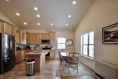 As you prepare meals, enjoy the warmth provided by the heating system near dining table, ensuring a cozy atmosphere throughout.