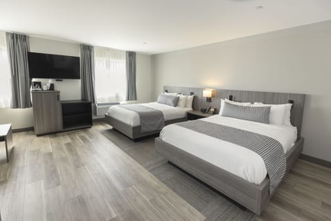 Premium bedding, down comforters, pillowtop beds, in-room safe