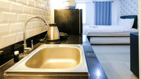 Studio | Private kitchen | Fridge, stovetop, cookware/dishes/utensils, dining tables