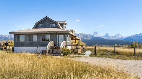 Take in beautiful, obstructed views of the Tetons from the comfort of this well-appointed family home.