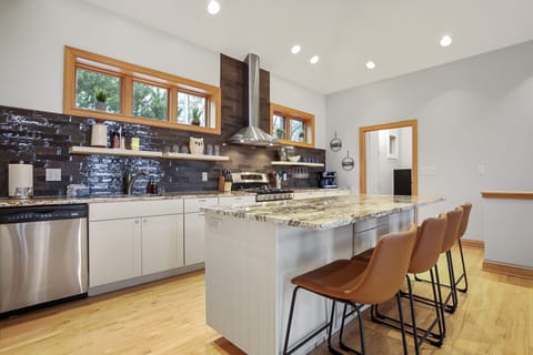 Plenty of extra seating at the bar for a front row view of the chef t