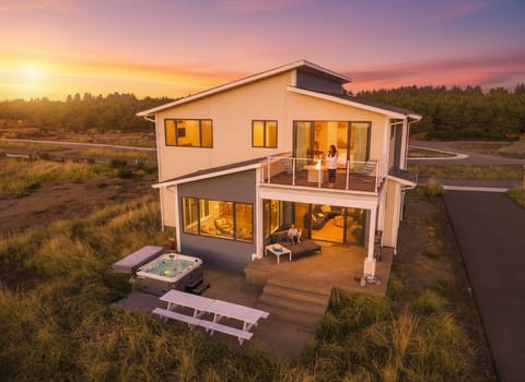 {Indigo} Soak in the ocean views, relax in the hot tub, and gather around picnic tables for unforgettable al fresco dining.