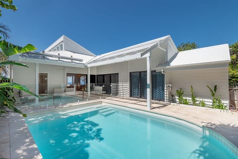 Pool area, captures ocean views, and coastal breezes at Seaviews Sunshine Beach.