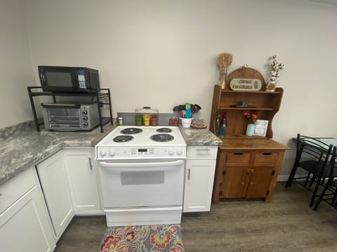 Pots and pans available for cooking meals. Microwave and toaster oven as well. 