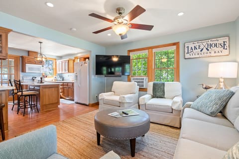 Modern, comfortable seating, includes a Smart TV and window AC unit