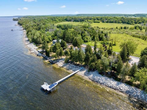 Large seasonal dock with rocky shoreline