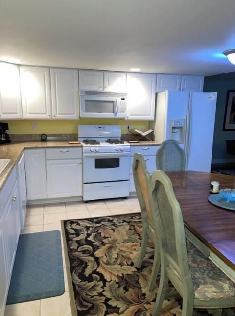 lower-level kitchen with dining table