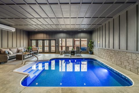 Indoor heated pool, comfy seating, smart TV (Dish TV), half bath in lower level.