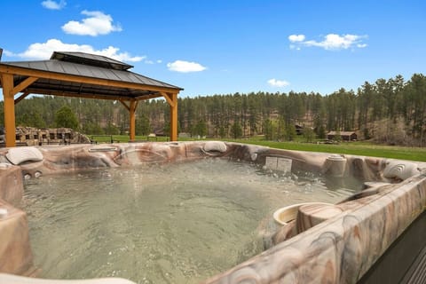 After a day of exploring or outdoor adventures, soak your cares away in the nice-sized, private hot tub.