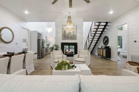 Open concept living room with see through fireplace!