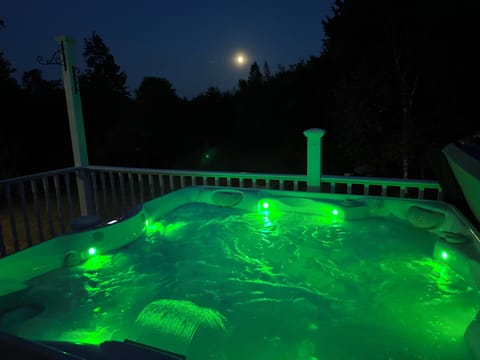 Beautiful lighted spa seats six over full moon