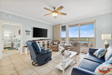 Relax in this coastal living room with ocean views and comfortable seating.