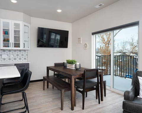 Dining Area with Direct Access to the Balcony and BBQ Grill.