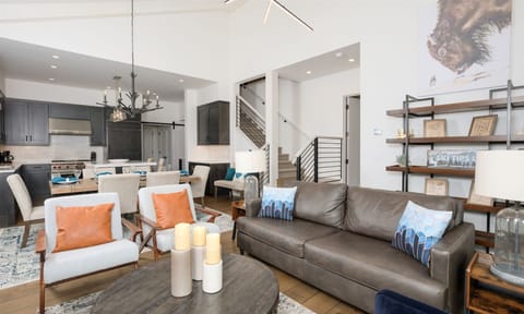 Main floor living room with wood burning fireplace, amazing views, Smart TV