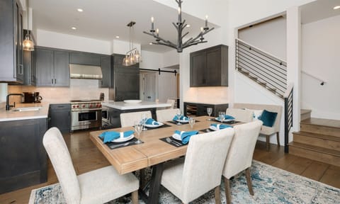 Dining area opens to mountain modern kitchen