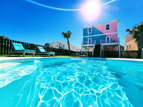 Private heated pool with loungers—just 200 ft from the Gulf at Sea La Vie!
