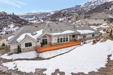 Stunning mountain-view retreat wrapped in serene winter beauty