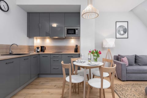 Kitchenette with dishwasher.